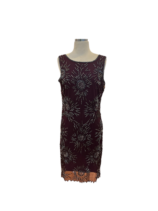 Amorin Vintage plum sleeveless cocktail dress with silver starburst beadwork and a sheer hem on a mannequin